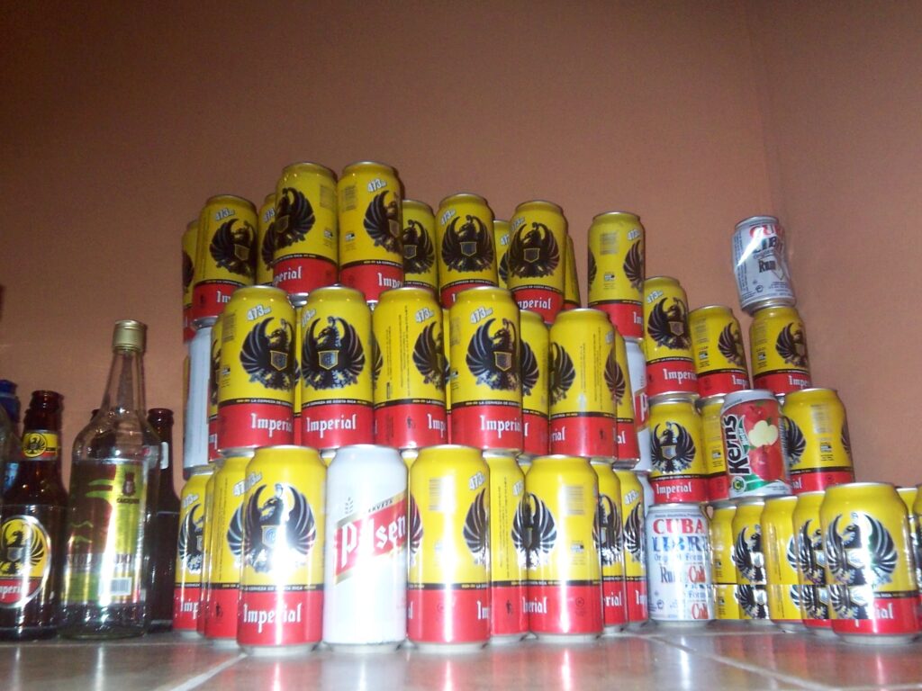 Imperial Beer - Cans Stacked On The Floor