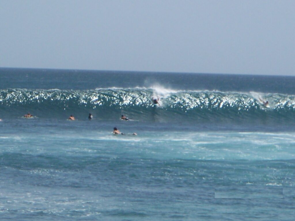 Surfers Splitting The Peak - Tamarindo Costa Rica