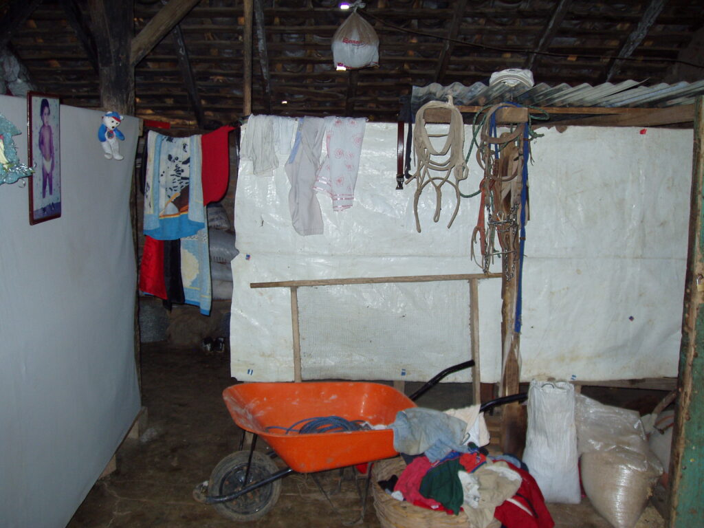 Interior of Home - Rural Nicaragua - Wheelbarrow, Horse Reigns, Rice Sacks
